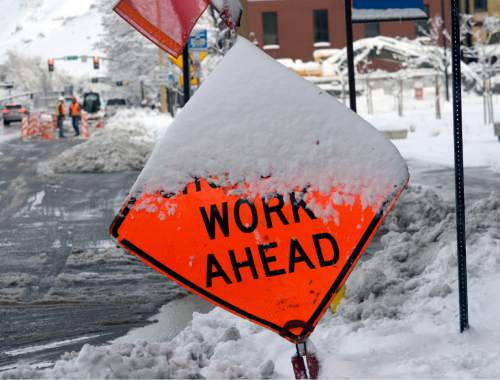 Al Hartmann  |  The Salt Lake Tribune
Their is work ahead for sure in downtown Salt Lake City City Tuesday morning Dec. 15 as the city digs out from yesterday's record breaking snowfall.