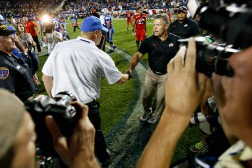 Trent Nelson  |  The Salt Lake Tribune
Utah Utes head coach Kyle Whittingham shakes hands with Brigham Young Cougars head coach Bronco Mendenhall after the Utes won as the BYU Cougars host the Utah Utes, college football Saturday, September 21, 2013 at LaVell Edwards Stadium in Provo.