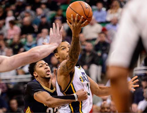 Trent Nelson  |  The Salt Lake Tribune
Utah Jazz guard Trey Burke (3) puts up a shot, defended by New Orleans Pelicans forward Anthony Davis (23) as the Utah Jazz host the New Orleans Pelicans, NBA basketball in Salt Lake City, Wednesday December 16, 2015.
