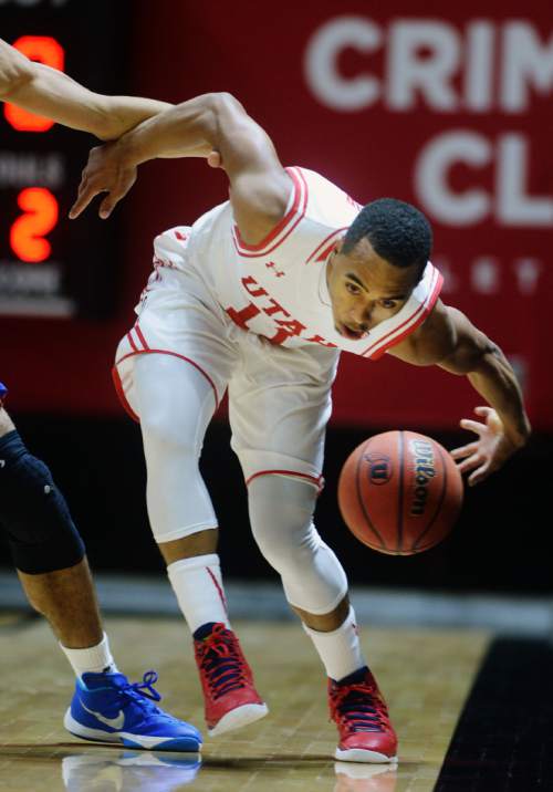 Steve Griffin  |  The Salt Lake Tribune

Utah Utes guard Brandon Taylor (11) tries to save the ball from join out of bounds during action in the Utah versus Savannah State men's basketball game at the Huntsman Center in Salt Lake City, Wednesday, December 16, 2015.