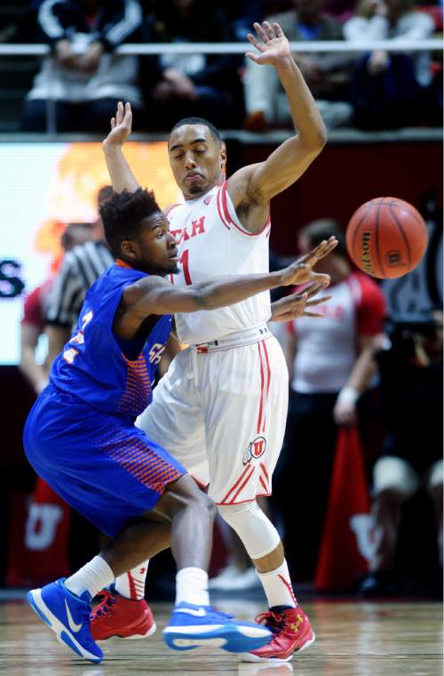 Steve Griffin  |  The Salt Lake Tribune

Utah Utes guard Brandon Taylor (11) gets between Savannah State Tigers guard Khalen Pinkett (2) and the ball as he plays tight defuse during action in the Utah versus Savannah State men's basketball game at the Huntsman Center in Salt Lake City, Wednesday, December 16, 2015.