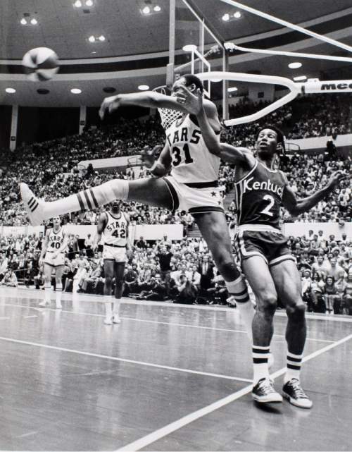 Lynn R. Johnson | The Salt Lake Tribune Archive

Utah Stars center Zelmo Beaty (31) saves the ball from going out of bounds while being defended by Kentucky Colonels forward Walt Simon (2) during their 1971 ABA basketball game.