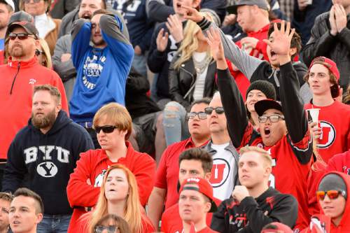 Trent Nelson  |  The Salt Lake Tribune
BYU and Utah fans react during the third quarter as Utah faces BYU in the Royal Purple Las Vegas Bowl, NCAA football at Sam Boyd Stadium in Las Vegas, Saturday December 19, 2015.