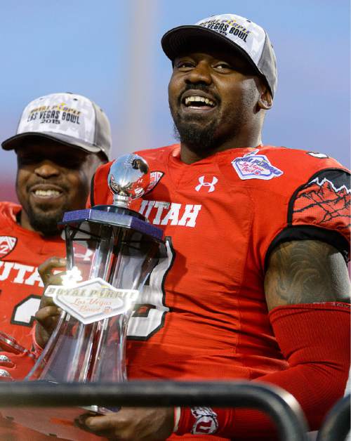 Trent Nelson  |  The Salt Lake Tribune
Utah Utes defensive back Tevin Carter (9) celebrates the win and the MVP award as Utah defeats BYU 35-28 in the Royal Purple Las Vegas Bowl, NCAA football at Sam Boyd Stadium in Las Vegas, Saturday December 19, 2015.