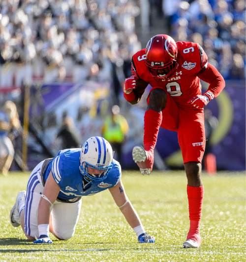 Trent Nelson  |  The Salt Lake Tribune
Utah Utes defensive back Tevin Carter (9) celebrates an incomplete pass after defending Brigham Young Cougars defensive lineman Remington Peck (44) as Utah faces BYU in the Royal Purple Las Vegas Bowl, NCAA football at Sam Boyd Stadium in Las Vegas, Saturday December 19, 2015.