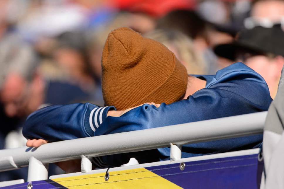 Trent Nelson  |  The Salt Lake Tribune
A BYU fan puts his head in his hands as Utah takes a 35-0 lead, as Utah faces BYU in the Royal Purple Las Vegas Bowl, NCAA football at Sam Boyd Stadium in Las Vegas, Saturday December 19, 2015.