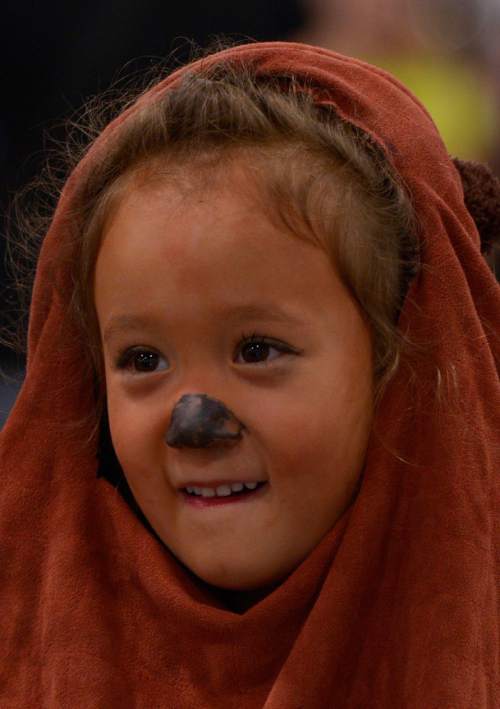 Leah Hogsten  |  The Salt Lake Tribune
Maisie Perham, 4, is an "Ewok" from the movie Star Wars. Scenes of cosplay September 4, 2014, during the second annual Comic Con, Sept. 4-6, at the Salt Palace Convention Center.