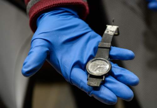 Francisco Kjolseth | The Salt Lake Tribune
A common black watch made by Advance is shown to the media as the Salt Lake City Police Department seeks the publicís assistance in identifying a white female, whose decomposing body was found on September 3, 1986, floating in a canal east of a sewage treatment plant at 1850 North Redwood Road. The watch was found on the wrist of the body. The State Medical Examinerís Office determined the death to be suspicious.
