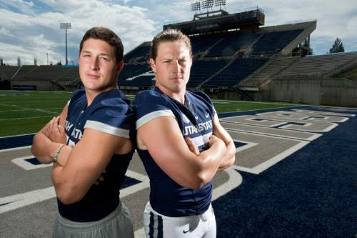 Lennie Mahler  |  The Salt Lake Tribune
Utah State's Nick and Zach Vigil pose for a portrait during media day press availability at Romney Stadium in Logan, Utah, Aug. 4, 2014.