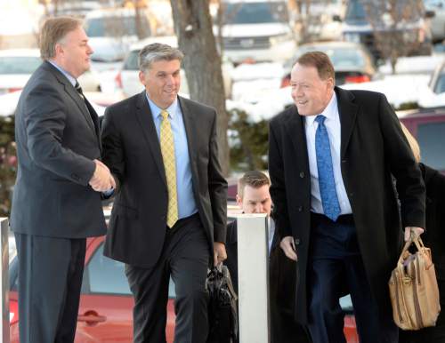 Al Hartmann  |  The Salt Lake Tribune
Mike Mower, Deputy Chief-of Staff for Governor Gary Herbert, left, greets San Juan County Commissioner Phil Lyman as he walks to sentencing hearing in Federal Court in Salt Lake City Friday Dec. 18.  Lawyer Peter Stirba, right. He faces up to one year in jail for his role in organizing, promoting and leading the 2014 ATV protest in Recapture Canyon.