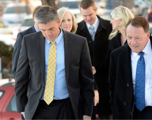 Al Hartmann  |  The Salt Lake Tribune
Al Hartmann  |  The Salt Lake Tribune
San Juan County Commissioner Phil Lyman, left, walks to sentencing hearing in Federal Court in Salt Lake City Friday Dec. 18.  He faces up to one year in jail for his role in organizing, promoting and leading the 2014 ATV protest in Recapture Canyon.