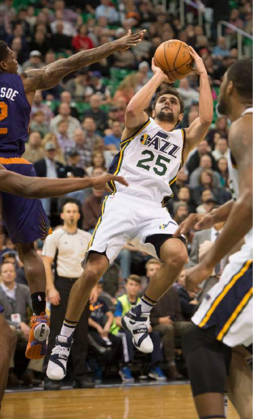 Rick Egan  |  The Salt Lake Tribune

Utah guard Raul Neto (25) takes a shot for the Jazz, in NBA action Phoenix Suns vs. The Utah Jazz, in Salt Lake City, Monday, December 21, 2015.