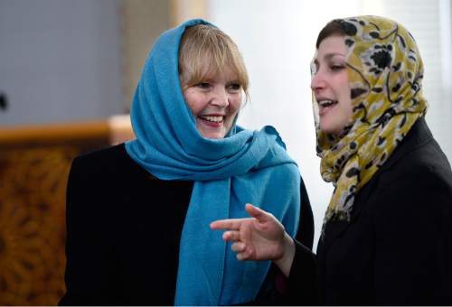 Scott Sommerdorf   |  The Salt Lake Tribune
The Rev. Patty C. Willis, left, of the Unitarian Church speaks with Rabbi Ilana Schwartzman of Salt Lake City's Jewish Congregation Kol Ami at a news conference at Khadeeja Islamic Center in West Valley City, Thursday, December 17, 2015.
Noor Ul-Hasan and invited politicos and other interfaith reps joined together to announce "Wear a Hijab" and other headgear on Friday as a show of support for Muslims.
