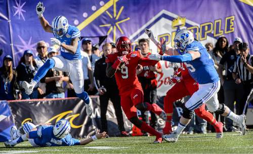 Trent Nelson  |  The Salt Lake Tribune
Utah Utes defensive back Tevin Carter (9) runs back an interception as Utah faces BYU in the Royal Purple Las Vegas Bowl, NCAA football at Sam Boyd Stadium in Las Vegas, Saturday December 19, 2015.