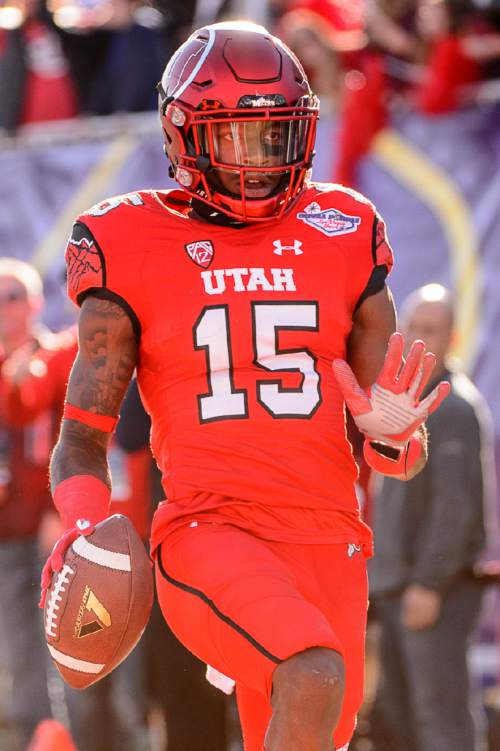 Trent Nelson  |  The Salt Lake Tribune
Utah Utes defensive back Dominique Hatfield (15) runs for a touchdown after an interception as Utah faces BYU in the Royal Purple Las Vegas Bowl, NCAA football at Sam Boyd Stadium in Las Vegas, Saturday December 19, 2015.