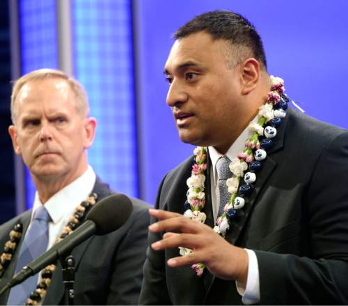 Al Hartmann  |  The Salt Lake Tribune
Kalani Sitake is announced as BYU's new head coach at a press conference in Provo Monday Dec. 21.  He answers questions with BYU Athletic Director Tom Holmoe, left.