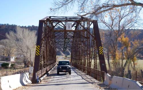 (Lynn R. Johnson / Special to The Salt Lake Tribune - The Rockville Bridge on the Smithsonian Butte was constructed in 1924 and is the last structure of its type in Utah.  The single-lane bridge is on the National Register of Historic Places.
