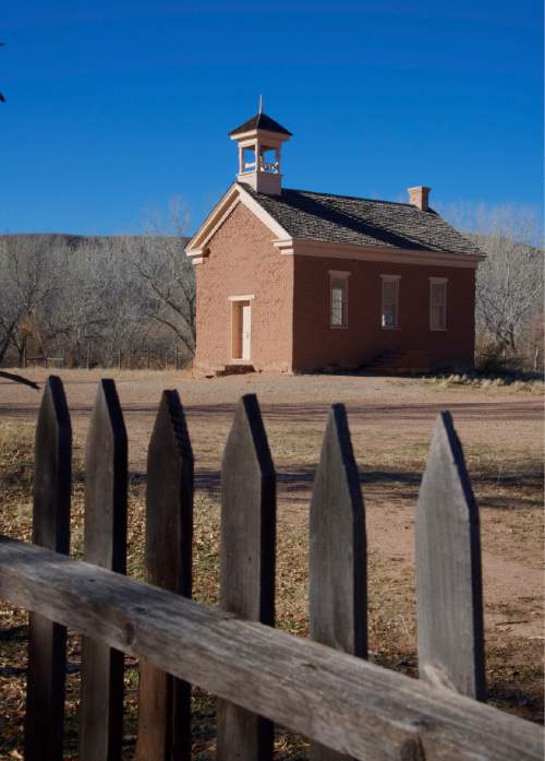 (Lynn R. Johnson / Special to The Salt Lake Tribune -- Built by settlers in 1886, the iconic Grafton School near Rockville, Utah, is near the end of the Smithsonian Butte.
