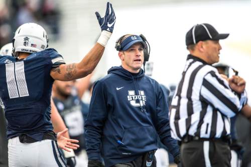 Chris Detrick  |  The Salt Lake Tribune
Utah State Aggies head coach Matt Wells during the Famous Idaho Potato Bowl at Albertsons Stadium in Boise, Idaho Tuesday December 22, 2015.  Akron Zips lead Utah State Aggies 13-7 at halftime.