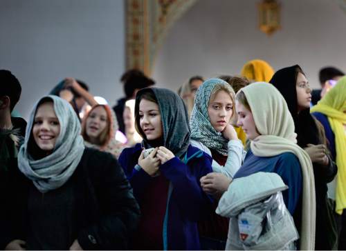 Scott Sommerdorf   |  The Salt Lake Tribune
Students from Corner Canyon High School leave after a visit with Imam Muhammed S. Mehtar. They listened to him speak about the hijab and its meaning in Islamic culture prior to a news conference at the Khadeeja Islamic Center in West Valley City, Thursday, December 17, 2015.
Noor Ul-Hasan later introduced invited guests and other interfaith reps who joined together to announce "Wear a Hijab" and other headgear on Friday as a show of support for Muslims.