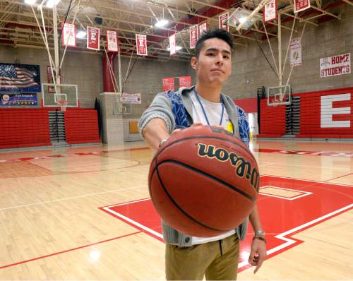 Al Hartmann  |  The Salt Lake Tribune
East High School guard Dacian Spotted Elk is one of the bright talents in the state of Utah, but he also representing his heritage as a Native American on the basketball court.