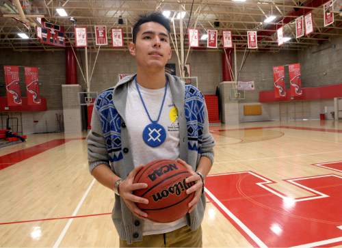 Al Hartmann  |  The Salt Lake Tribune
East High School guard Dacian Spotted Elk is one of the bright talents in the state of Utah, but he also representing his heritage as a Native American on the basketball court.