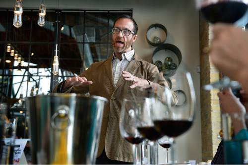 Scott Sommerdorf   |  The Salt Lake Tribune
Utah sommelier Jimmy Santangelo leads a Beaujolais Nouveau tasting and educational event at the Under Current bar in Salt Lake City, Thursday, November 19, 2015.