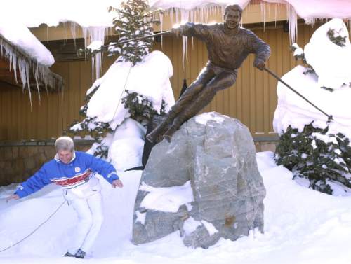 Leah Hogsten | 2001 Tribune file photo .
On Dec. 8, 2001, Olympian and world champion skier Stein Eriksen struck a skiing pose next to the newly unveiled bronze statue of himself titled "Come Ski With Me." A crowd gathered at the entrance of Snow Park Lodge to honor Eriksen, with then-Gov. Mike Leavitt  on hand to declare  "Stein Eriksen Day."