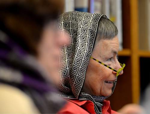 Steve Griffin  |  The Salt Lake Tribune

Mimi Turner, wears a headscarf during a Social Action Network meeting at Congregation Kol Ami in Salt Lake City, Friday, December 18, 2015.  The women were wearing headscarves in solidarity with the Muslim community.
