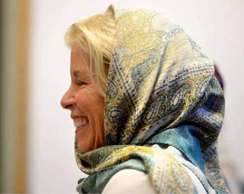 Steve Griffin  |  The Salt Lake Tribune

Bonnie Rokeach, wears a headscarf during a Social Action Network meeting at Congregation Kol Ami in Salt Lake City, Friday, December 18, 2015.  The women were wearing headscarves in solidarity with the Muslim community.