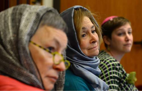 Steve Griffin  |  The Salt Lake Tribune
Mimi Turner and Kay Brief wear a headscarves during a Social Action Network meeting at Congregation Kol Ami in Salt Lake City on Friday. The women were wearing headscarves in solidarity with the Muslim community.