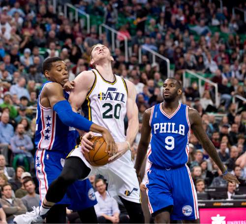 Lennie Mahler  |  The Salt Lake Tribune

Gordon Hayward draws a foul from Richaun Holmes in the first half of a game against the Philadelphia 76ers at Vivint Smart Home Arena, Monday, Dec. 28, 2015.