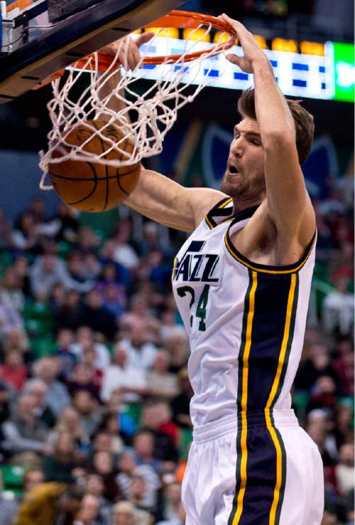 Lennie Mahler  |  The Salt Lake Tribune

Jazz center Jeff Withey dunks the ball in the first quarter of a game against the Philadelphia 76ers at Vivint Smart Home Arena, Monday, Dec. 28, 2015.