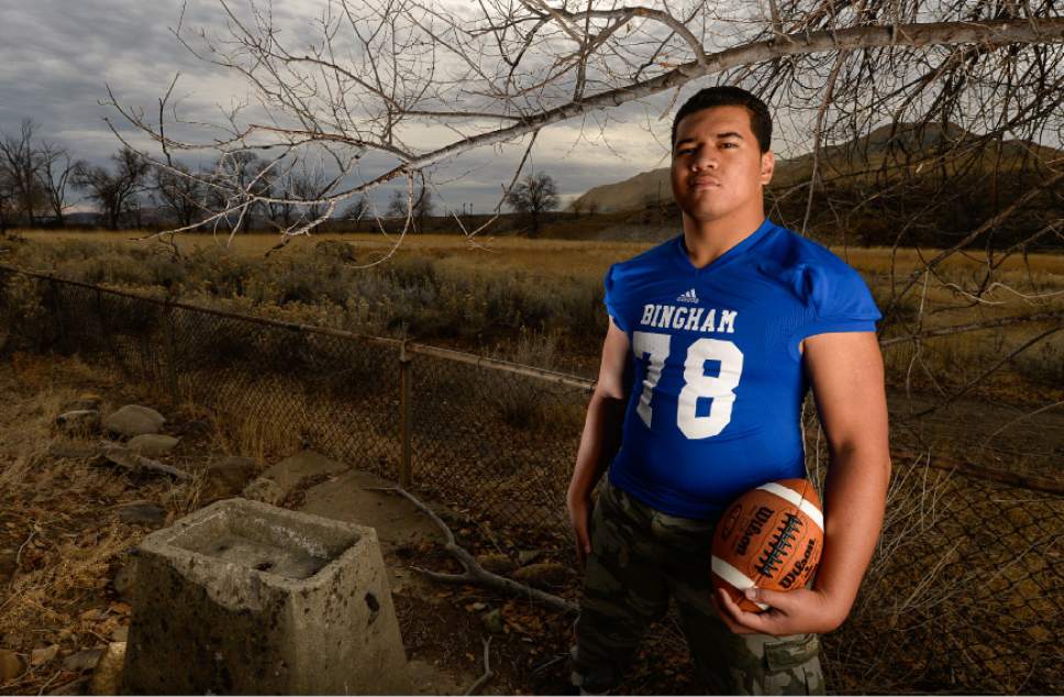 Francisco Kjolseth | The Salt Lake Tribune
Bingham defensive tackle Jay Tufele visits his school's early prized football history in the town of Copperton, just below the mine, where an old drinking fountain and the general shape of the football field still stands. Several coaches have said Tufele has the potential to be the best player in school history, and considering the talent that has circulated through the powerhouse program Û that's very telling.
