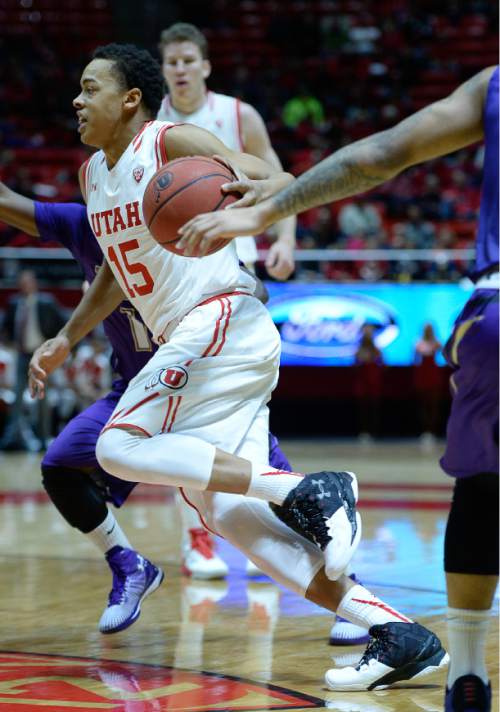 Francisco Kjolseth | The Salt Lake Tribune
Utah Utes guard Lorenzo Bonam (15) drives the ball agains the College of Idaho in game action at the Huntsman Center on Monday night in the final non-conference game of the season.