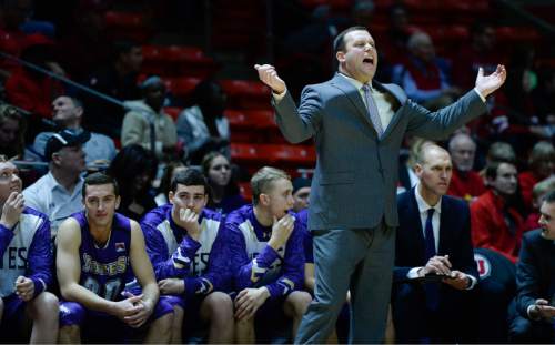 Francisco Kjolseth | The Salt Lake Tribune
College of Idaho coach Scott Garson tries to rally his team against Utah in game action at the Huntsman Center on Monday night in the final non-conference game of the season.