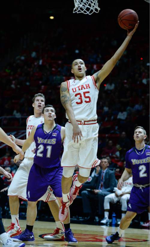 Francisco Kjolseth | The Salt Lake Tribune
Utah Utes forward Kyle Kuzma (35) sails past the College of Idaho in game action at the Huntsman Center on Monday night in the final non-conference game of the season.