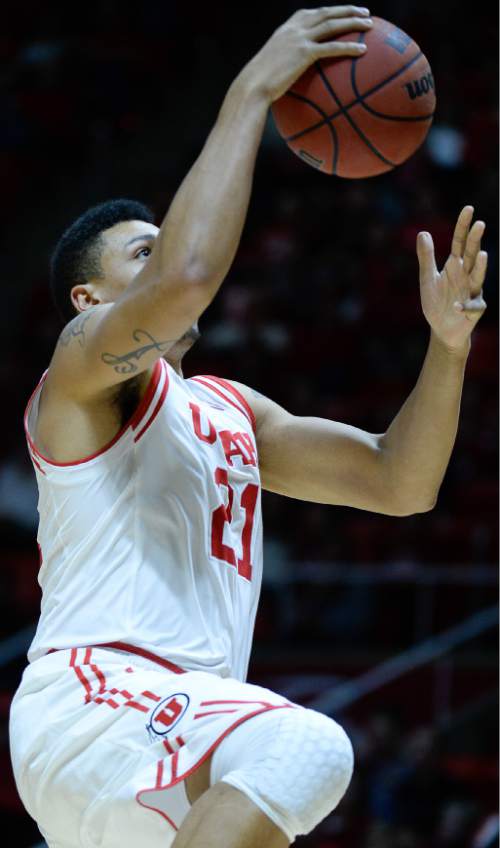 Francisco Kjolseth | The Salt Lake Tribune
Utah Utes forward Jordan Loveridge (21) drives the ball to the basket against the College of Idaho in game action at the Huntsman Center on Monday night in the final non-conference game of the season.
