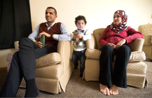 Steve Griffin  |  The Salt Lake Tribune
Mohammed Alhareb his wife, Sarah Alsahyem, and 2-year-old son, Ridha Alhareb, in their home in Millcreek, Friday, Dec. 18, 2015.  The family has been in Utah for nine months since leaving Iraq.
