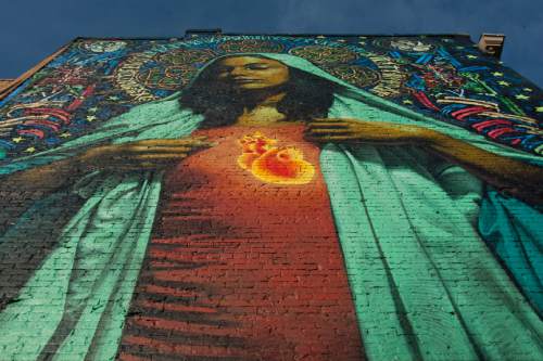 Photo by Chris Detrick  |  The Salt Lake Tribune

A 44x22 foot mural of the Virgin Mary on the east side of the building at 158 E 200 South Saturday, February 20, 2010. Two artists, El Mac and Retna, created the mural.
