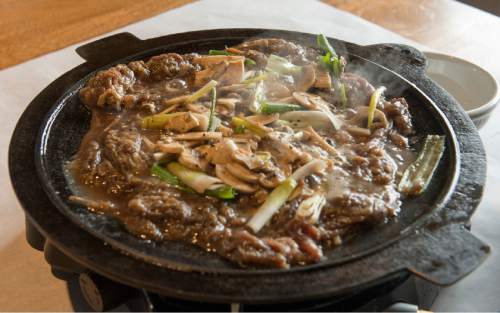 Rick Egan  |  The Salt Lake Tribune

The Table BBQ with marinated select beef, at the Seoul Garden Korean restaurant.