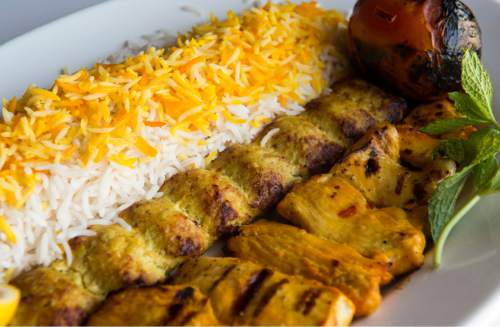 Rick Egan  |  The Salt Lake Tribune

The Chicken Soltani plate: includes two chicken skewers (one ground chicken the other marinated and charbroiled) served with rice and grilled tomato at the Zaferan Cafe, in Cottonwood Heights.