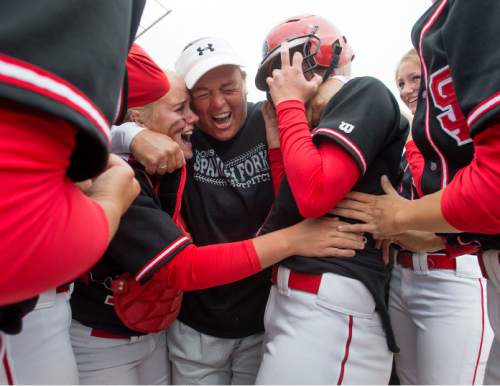 Steve Griffin  |  The Salt Lake Tribune


Spanish Fork's Cheyenne Pratt, right,  is mauled by teammates and her coach after she smashed a walk off home run with two outs in the bottom of the seventh inning giving Spanish Fork the 4A championship against Maple Mountain at the Valley Softball Complex in Taylorsville, Friday, May 22, 2015.