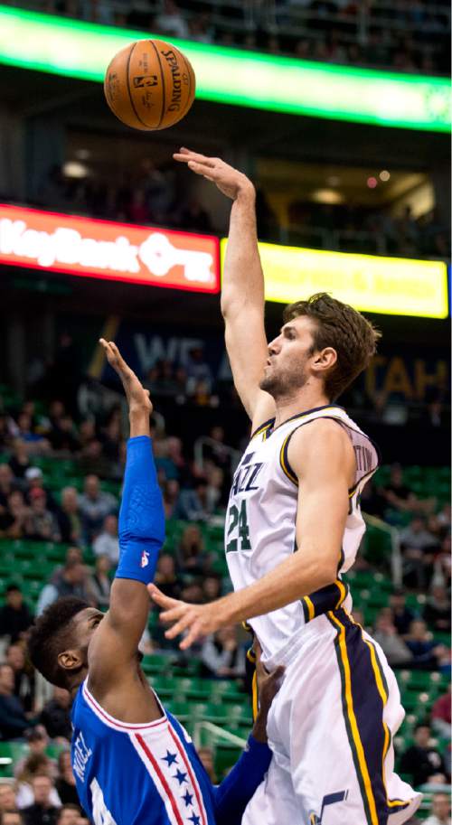 Lennie Mahler  |  The Salt Lake Tribune

Jazz center Jeff Withey shoots over Nerlens Noel in the first quarter of a game against the Philadelphia 76ers at Vivint Smart Home Arena, Monday, Dec. 28, 2015.