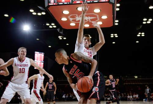 Utah forward Kyle Kuzma (35) is defended by Stanford forward Rosco Allen during the first half of an NCAA college basketball game Friday, Jan. 1, 2016, in Stanford, Calif. (AP Photo/Marcio Jose Sanchez)