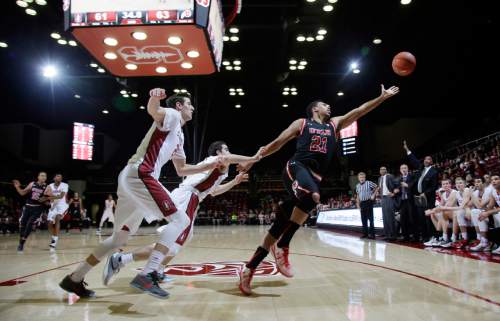 Utah forward Jordan Loveridge (21) reaches for an inbound pass against Stanford during the second half of an NCAA college basketball game Friday, Jan. 1, 2016, in Stanford, Calif. Stanford won 70-68 in overtime. (AP Photo/Marcio Jose Sanchez)