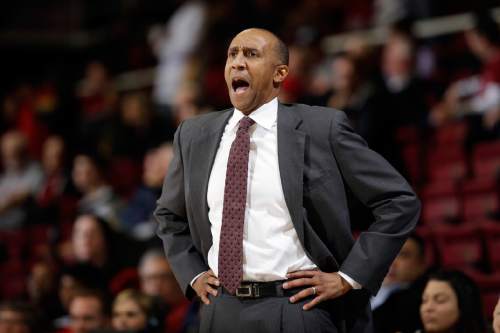 Stanford head coach Johnny Dawkins directs his team during the first half of an NCAA college basketball game against Utah Friday, Jan. 1, 2016, in Stanford, Calif. (AP Photo/Marcio Jose Sanchez)