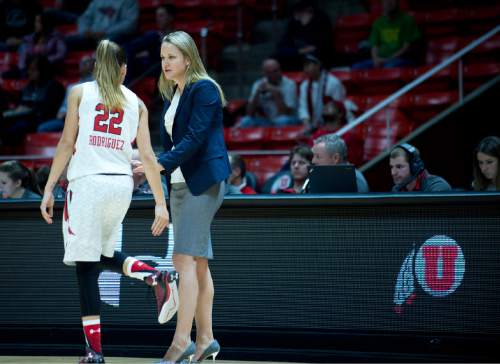 Lennie Mahler  |  The Salt Lake Tribune

Utah's Danielle Rodriguez talks with head coach Lynne Roberts in a game against South Dakota at the Huntsman Center in Salt Lake City, Friday, Nov. 13, 2015.