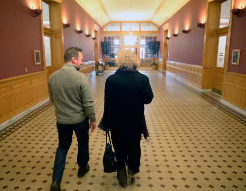 Al Hartmann  |  The Salt Lake Tribune
Mayor-elect Jackie Biskupski walks with Councilman-elect Andrew Johnston in Salt Lake City Hall.