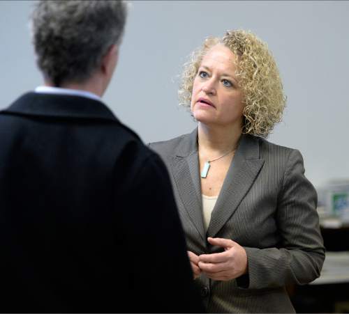 Al Hartmann  |  The Salt Lake Tribune
Mayor-elect Jackie Biskupski, talks with Patrick Leary, chief of staff, in her temporary fourth floor office in Salt Lake City Hall.